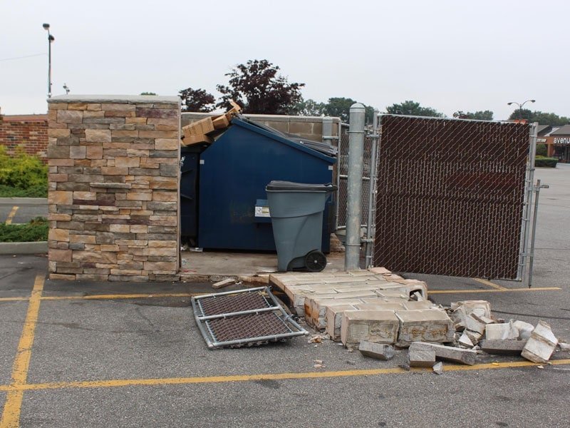 broken-block-dumpster-enclosure Trex Fencing vs. Masonry 9