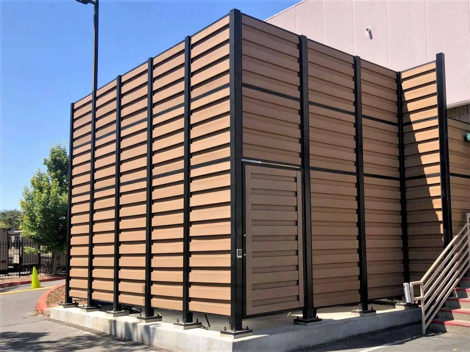 trex-horizons-security-fence-and-gate A 16 ft. tall Trex Horizons enclosure for a family entertainment facility.