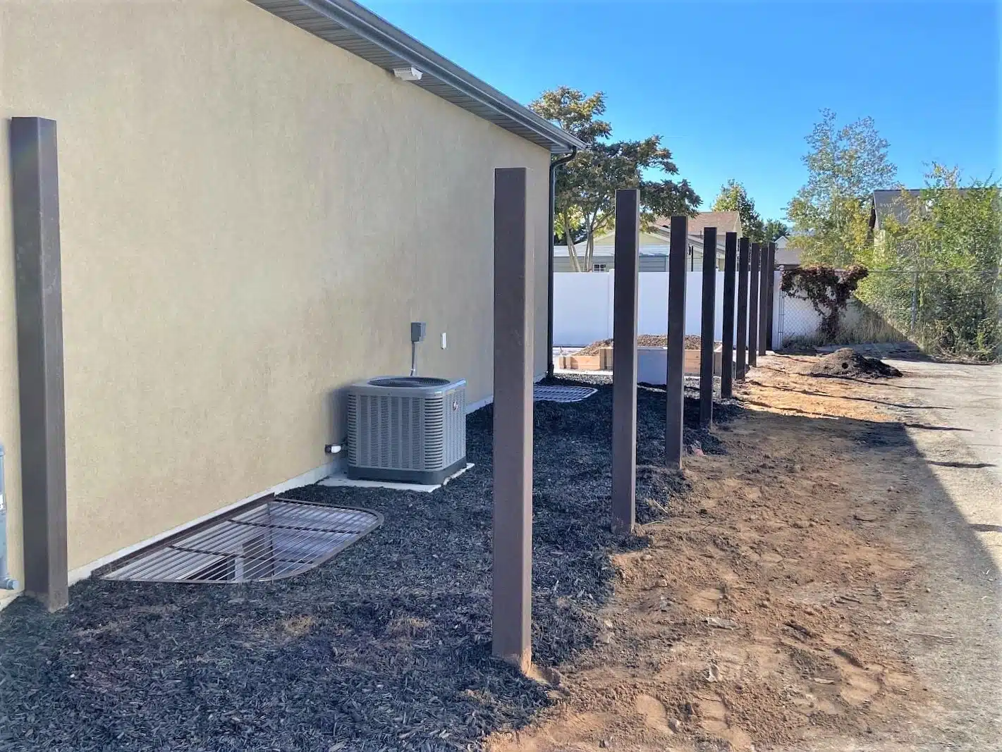 Setting Trex Fence Posts Trex Fence posts set to avoid underground utilities