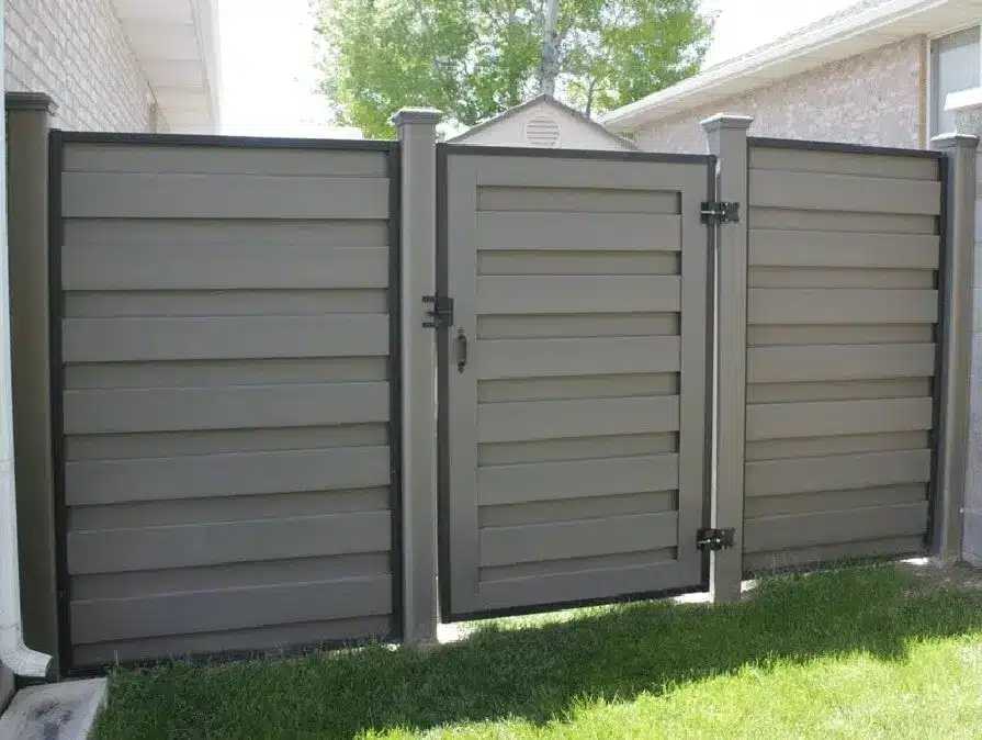 Trex composite gates integrated into a Trex privacy fence
